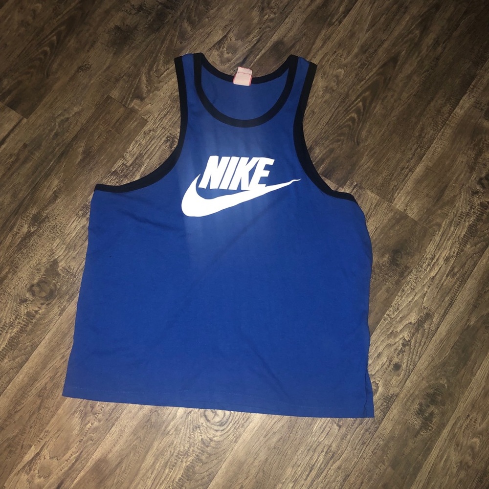 Blue with black trim Nike tank top.